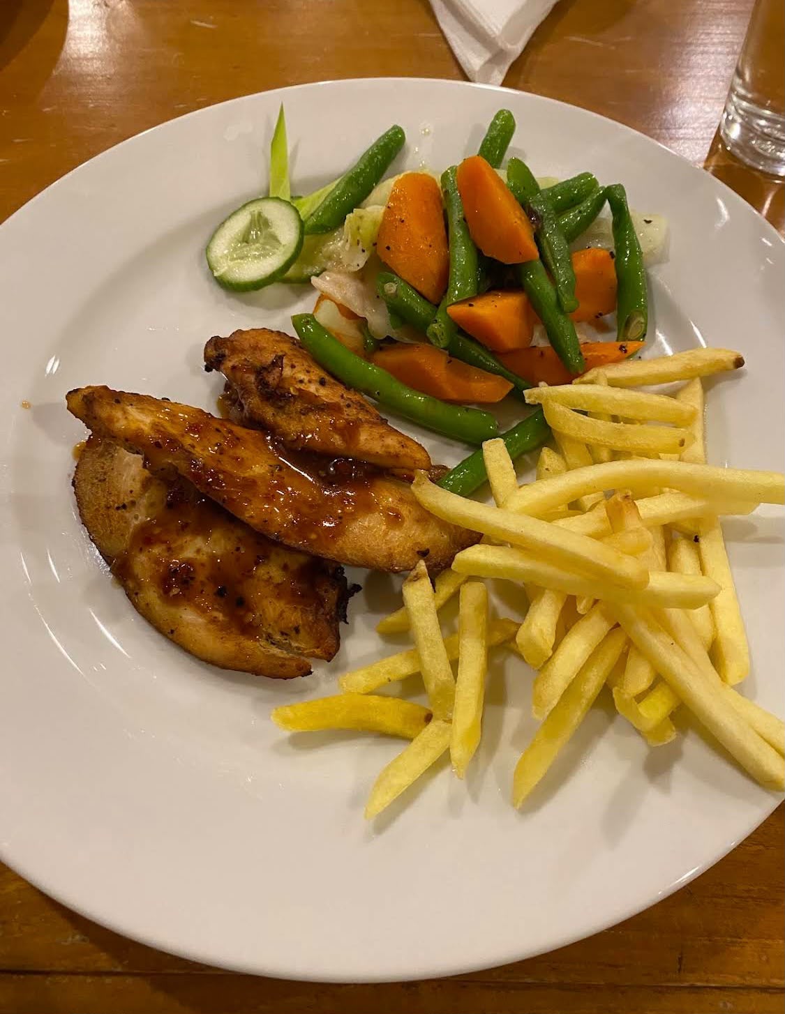 Chicken, fries, and vegetables served at the resort – kitesurfing accommodation in Kalpitiya